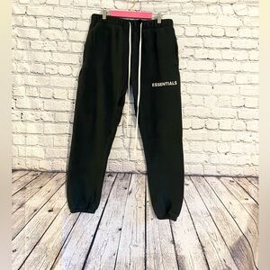 FEAR OF GOD ESSENTIALS. Black joggers. Size M